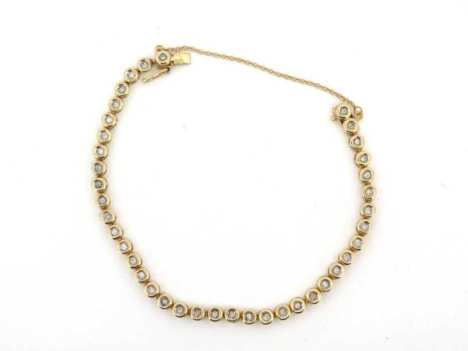 Bracelet vintage bracelet tennis serti de 39 diamants 1ct en or jaune 18k 58 Facettes 256655