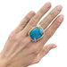 Ring 53 Pomellato ring, “The big blue”, in pink gold, chrysocolla and sapphires. 58 Facettes 30878