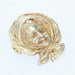 Brooch Old gold brooch bearing a child 58 Facettes 22-323