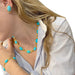 Collier Collier en or jaune décoré de turquoises. 58 Facettes 31468