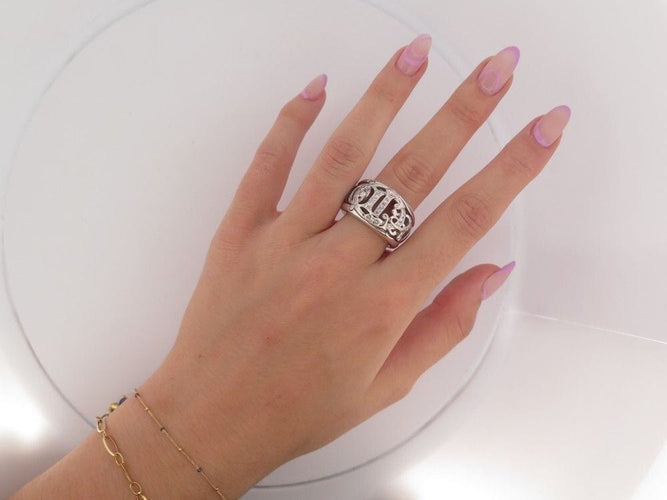 bague CHRISTIAN DIOR logo sertie de 50 diamants or blanc 18k