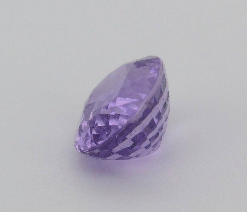 Gemstone Saphir violet non chauffé non traité 1.50cts 58 Facettes 53