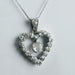 Pendentif Pendentif coeur en or blanc et diamants 58 Facettes 5603