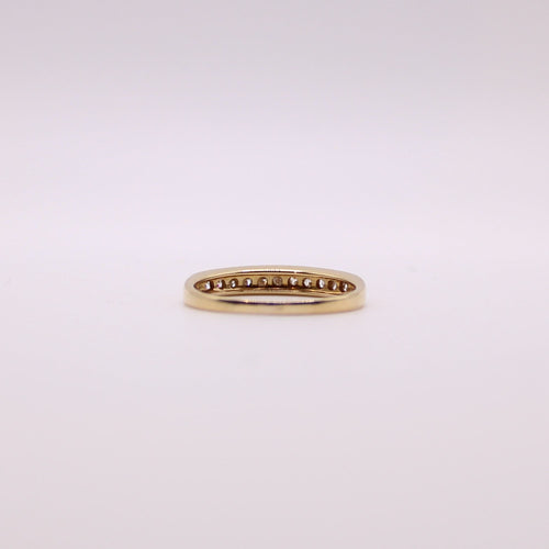 Bague Alliance demi-tour or jaune et diamants serti rail 58 Facettes