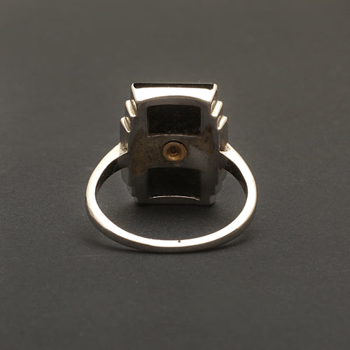 Bague Bague Art Déco en or gris, onyx et diamant "Blink" 58 Facettes 1966