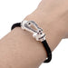 Fred bracelet, “Force 10”, white gold, steel and black diamonds. 58 Facettes 33414