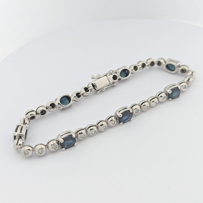 Bracelet Bracelet or blanc, diamants et saphirs 58 Facettes 25534