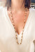 Long necklace in chiseled gold pearls and tiger's eye pearl 58 Facettes 1