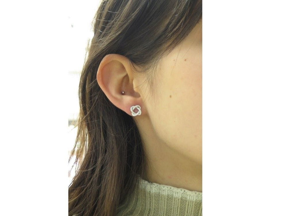 Boucles d'oreilles boucles d'oreilles POIRAY puces tresse or blanc diamants 58 Facettes 254847