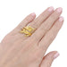 Ring 51 Textured yellow gold cross ring. 58 Facettes 33602