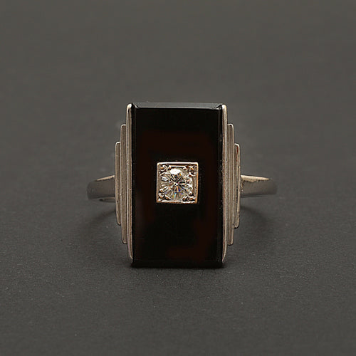 Bague Bague Art Déco en or gris, onyx et diamant "Blink" 58 Facettes 1966