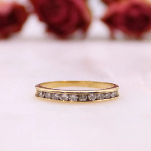 Bague Alliance demi-tour or jaune et diamants serti rail 58 Facettes