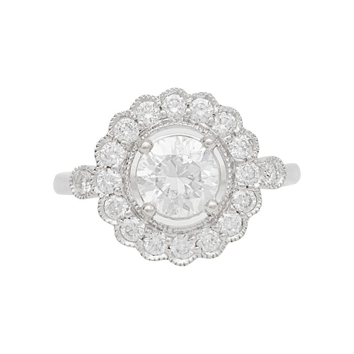 Bague 52 Bague marguerite en or blanc et diamants. 58 Facettes 31236