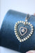 Diamond and pearl heart pendant necklace in platinum 58 Facettes