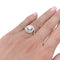 Bague 51 Solitaire Cartier, "Trinity Ruban", platine et diamants. 58 Facettes 32710