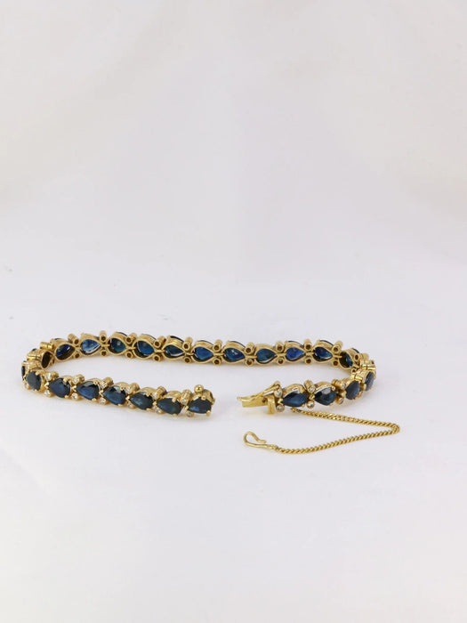 Bracelet Bracelet vintage en or, saphirs taillés en poire et diamants 58 Facettes J223