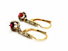 Earrings Sleeper earrings Yellow gold Ruby 58 Facettes 1265915CD