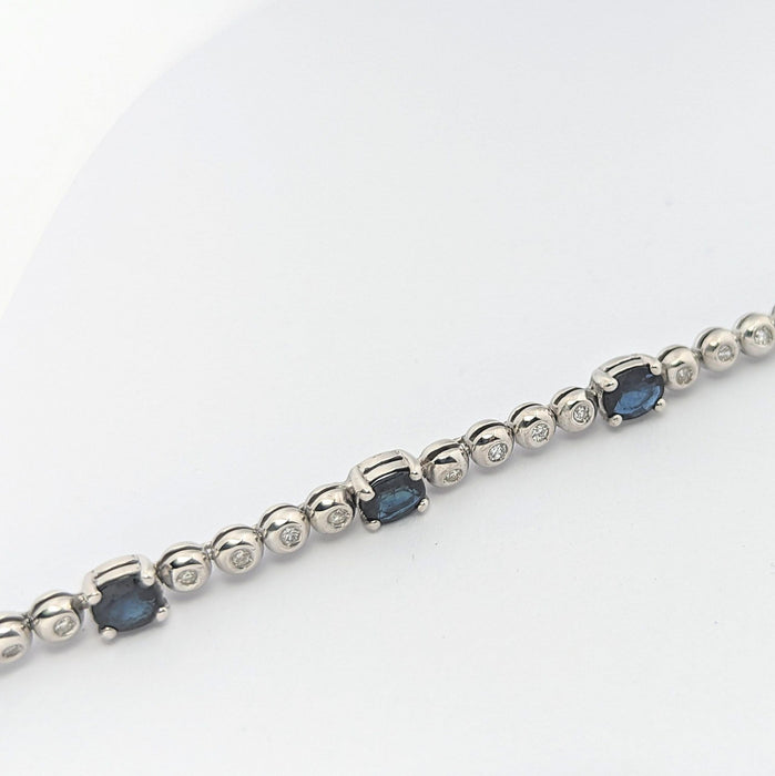 Bracelet Bracelet or blanc, diamants et saphirs 58 Facettes 25534