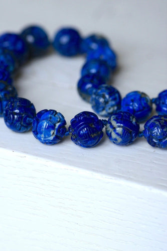 Collier Collier perles de lapis lazuli sculptées 58 Facettes