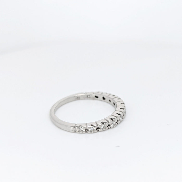 Bague Demi-alliance en or blanc et diamants 58 Facettes 21566