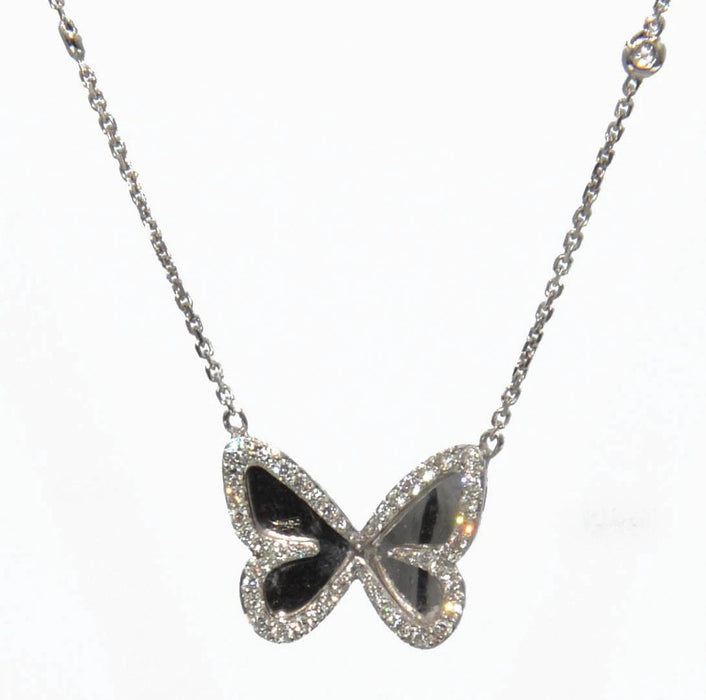 Pendentif Pendentif en or gris diamants avec pendentif papillon 58 Facettes 0