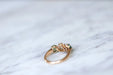 Ring Garter ring in pink gold, emeralds, and diamonds 58 Facettes