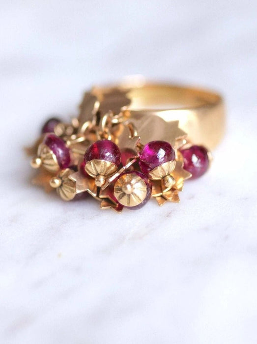 Bague Bague de cocktail vintage en or jaune et pampilles de rubis 58 Facettes