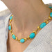 Collier Collier en or jaune décoré de turquoises. 58 Facettes 31468