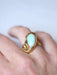 Vintage coiled snake ring in yellow gold, opal, and ruby 58 Facettes