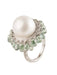 Ring 52 Ring in white gold, pearl, diamonds, and green tourmalines 58 Facettes