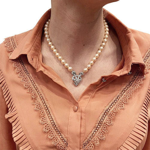 Collier Collier perles, or blanc et diamants. 58 Facettes 30937