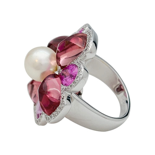 Bague 52 Bague Chanel, "San Marco", or blanc, perle, saphirs roses, tourmalines roses, diamants. 58 Facettes 31344