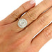 Bague 55 Bague marguerite en or blanc et diamants. 58 Facettes 31177