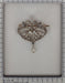 Brooch Pendant brooch with diamonds and seed pearls 58 Facettes 22059-0206