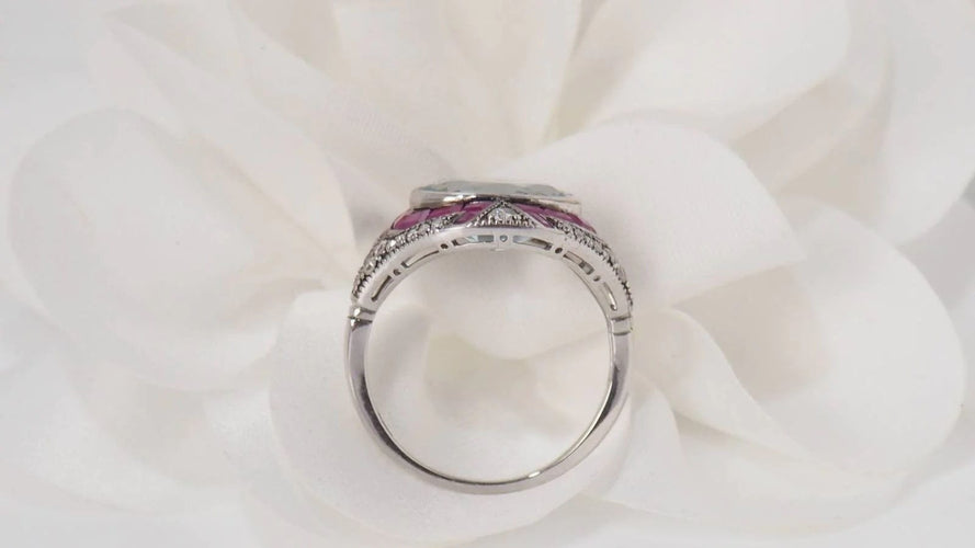Bague Bague Art Déco or blanc et argent, aigue marine, rubis et diamants 58 Facettes 31442