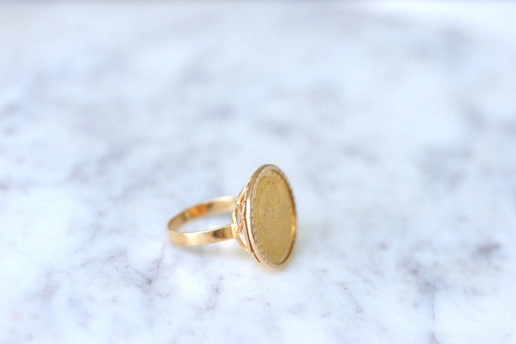 Bague Bague pièce Marianne 10 Francs en or jaune 58 Facettes