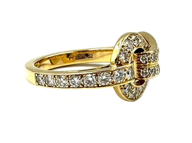 Bague 52 CARTIER. Collection Agrafe, bague en or jaune et diamants 58 Facettes