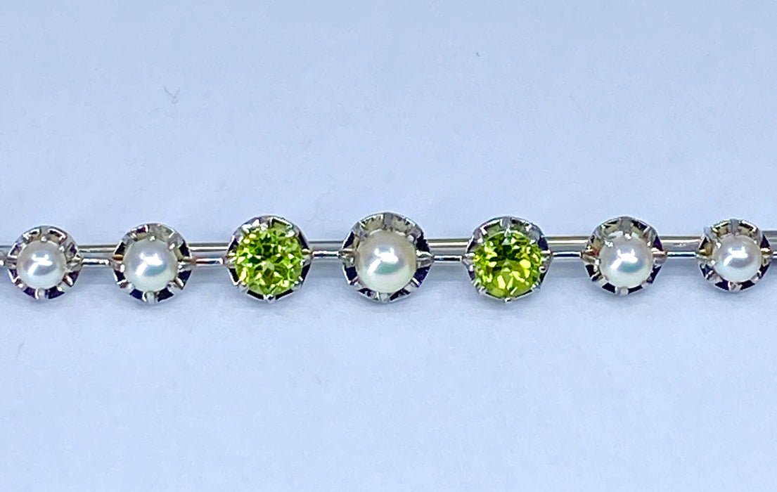 Broche Broche barette en or 18 carats et platine en perles et peridots 58 Facettes AB275