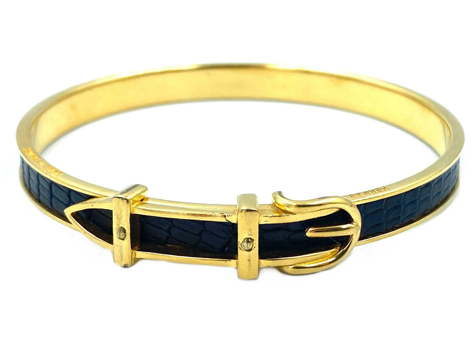 Bracelet Hermès. Bracelet jonc métal doré et cuir 58 Facettes