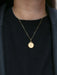 AUGIS pendant - L'originale medal in gold More than yesterday, less than tomorrow 58 Facettes J234