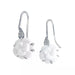 Boucles d'oreilles Boucles d'oreilles Chanel, "Camélia", or blanc, diamants. 58 Facettes 32717