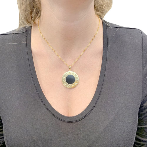 Collier Collier Bulgari "Bulgari Bulgari" or jaune, acier, onyx. 58 Facettes 33498