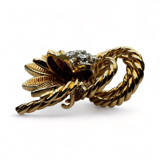 Broche REGNER Broche-clip fleur en or et platine serti de diamants. 58 Facettes
