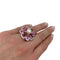 Bague 52 Bague Chanel, "San Marco", or blanc, perle, saphirs roses, tourmalines roses, diamants. 58 Facettes 31344