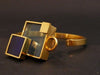 Bracelet Bracelet in gold metal and light blue and dark blue plexis. 58 Facettes 1035055