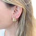 Earrings Cartier yellow gold and steel earrings. 58 Facettes 32904