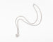 Pendentif Un pendentif or gris signé de la maison Chopard 58 Facettes