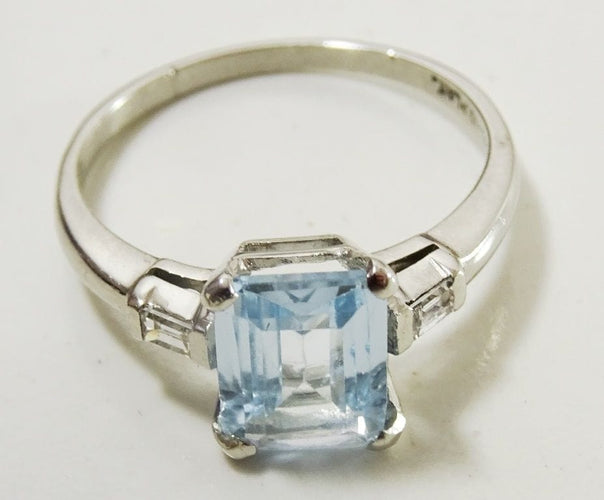 Bague 52 Bague aigue-marine et diamants 58 Facettes