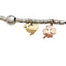 Bracelet Bracelet breloques Dodo, argent et or. 58 Facettes 31776