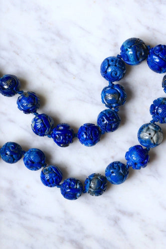 Collier Collier perles de lapis lazuli sculptées 58 Facettes